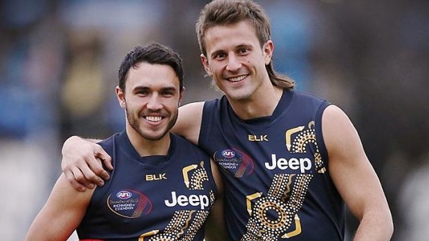 Richmond's Shane Edwards and Ivan Maric wear the Tigers' 2015 Dreamtime guernsey.