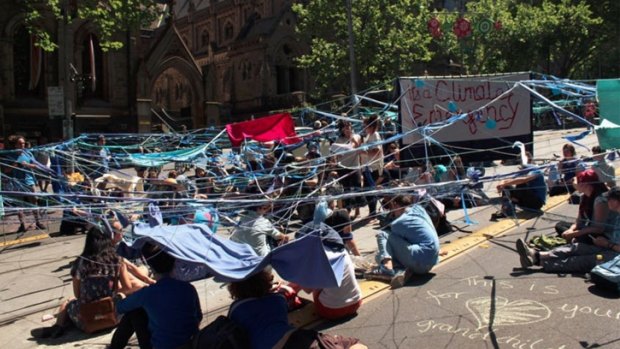 The protesters chained themselves together in Collins Street.