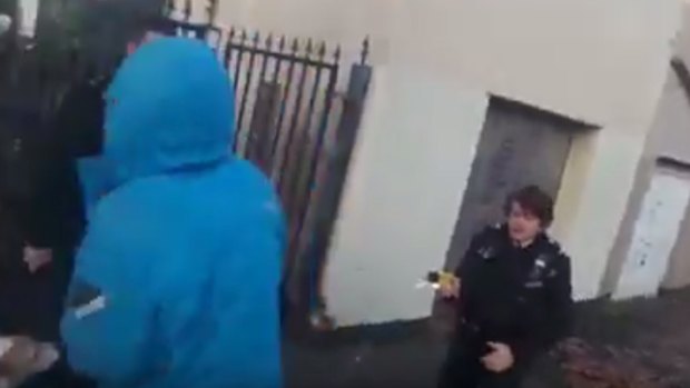 A still from a YouTube video that reportedly shows Judah Adunbi being Tasered by a police officer.