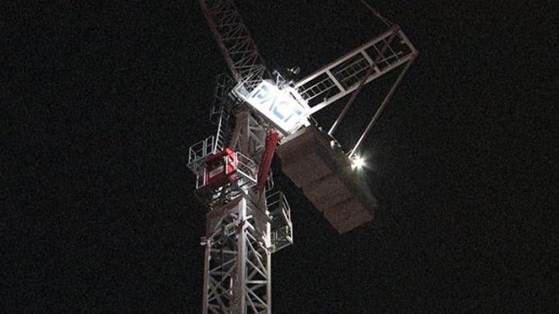 The teenage boy was stuck on the crane in Perth's CBD for about three hours.