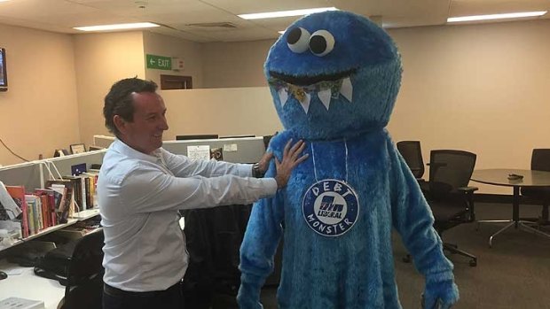 MarK McGowan with the Debt Monster, before copyright issues came back to bite Labor.