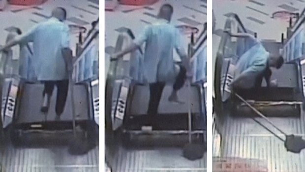 Zhang's leg gets caught in escalator at a shopping centre in Shanghai.