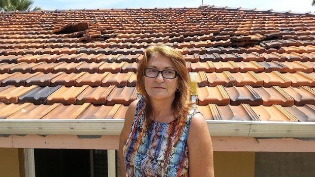 Girrawheen grandmother Joyce Ajdukovic believes a low-flying plane caused damage to her roof. 