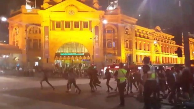 Apex gang rioters in Melbourne CBD, outside Flinders Street Station, Federation Square, Swanston Street.