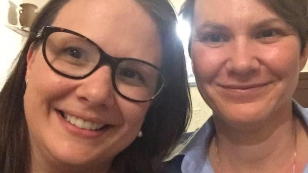 Kristina Antoniades (left), with her partner Merrin Hicks, has taken to Facebook to accuse Qantas of "blatant homophobia".