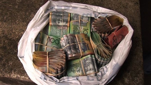 A witness in a murder investigation has been jailed after hiding $1.8 million in alleged drug money and refusing to reveal where it is.