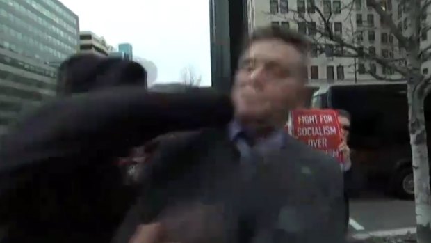 A man attacks Richard Spencer during the ABC's live interview.