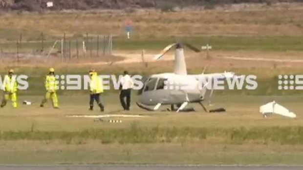 Two people have escaped serious injury after helicopter crash landed at Jandakot Airport.