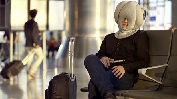 The 'Ostrich Pillow' is a new portable device that its inventors say will "enable power naps anytime, anywhere," including in airport lounges and on planes.