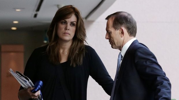 Tony Abbott in discussion with his chief of staff Peta Credlin.