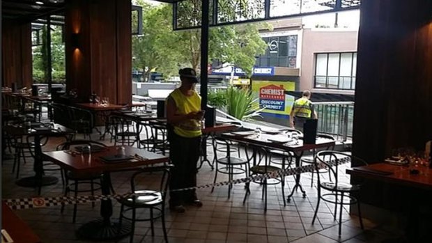 Police inside a cafe at Westfield Horsby.