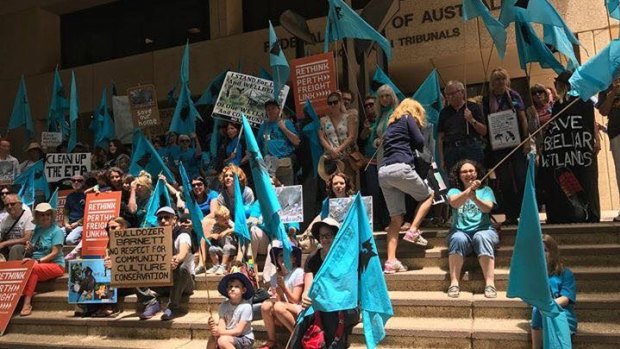 Protesters outside the court on Friday. 