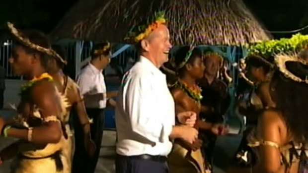 Bill Shorten dances with locals during a trip to Kiribati to raise awareness of climate change.