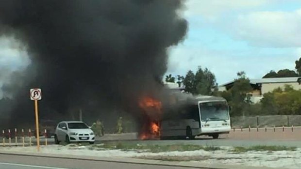 The fire took only a few minutes to destroy the coach, an onlooker said. 