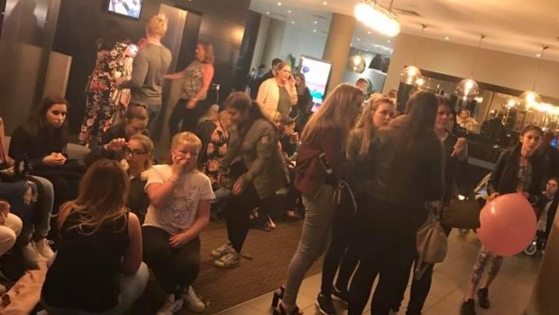 Teenagers seek refuge at a Manchester hotel in the wake of the explosion.