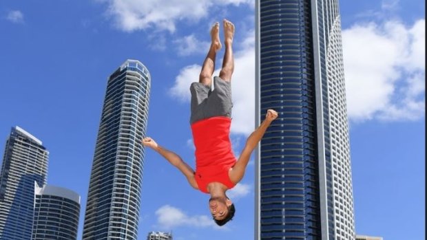Bleach Festival trampolinist Jacob Hunt upside down in Surfer's Paradise