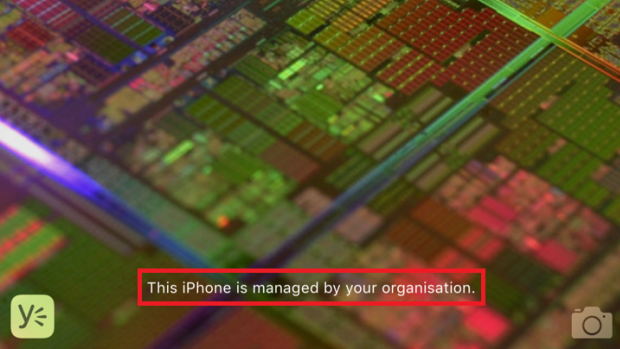 This message will apear on the bottom of an iPhone's lockscreen if it is being monitored by an employer.