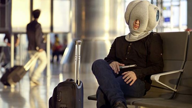 The 'Ostrich Pillow': inventors say will "enable power naps anytime, anywhere," including in airport lounges and on planes.