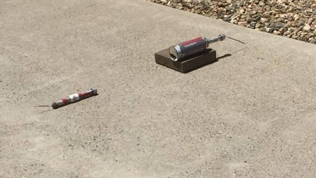 Redlynch resident Saskia Wilson said she woke up to find these suspected pipe bombs on her driveway and all her neighbours evacuated.