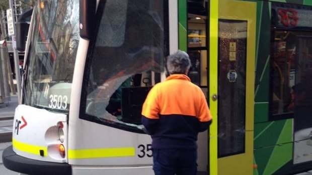 The aftermath of a collision between a tram and a horse pulling a carriage in Swanston Street on Friday.