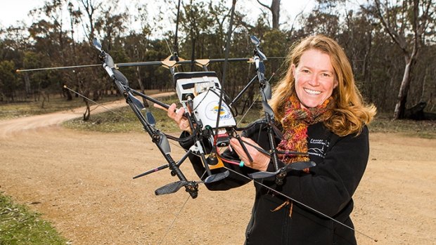 Deb Saunders from ANU tests out a drone for wildlife tracking. 