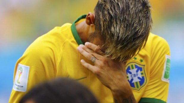 Brought to tears: Neymar cries during the national anthem.