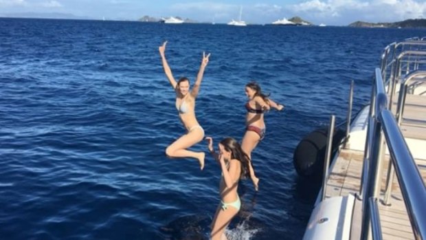 Karlie Kloss holidaying with the youngest Murdoch children, Chloe and Grace, over New Years.