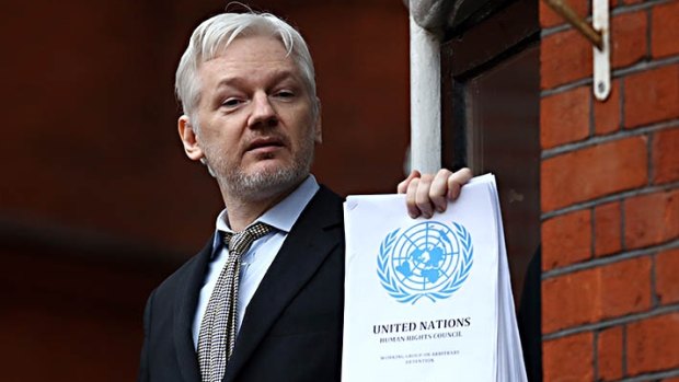 Julian Assange speaks from the balcony of the Ecuadorian embassy where he continues to seek asylum.