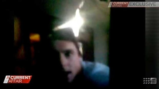Footage shows Jake Carlisle purporting to snort white powder in a hotel room.