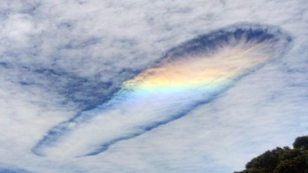 Leesa Willmott's photograph shot on her smartphone in Wonthaggi of a rare punch-hole rainbow cloud.