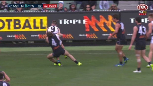 Carlton's Bryce Gibbs was banned for this tackle on Port Adelaide's Robbie Gray in June.