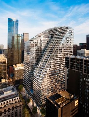The hotel is built inside the East Tower of the arresting, tripodic, $1.25 billion Collins Arch development.
