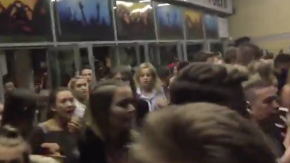 Concertgoers attempting to get out of Manchester Arena following an explosion. 