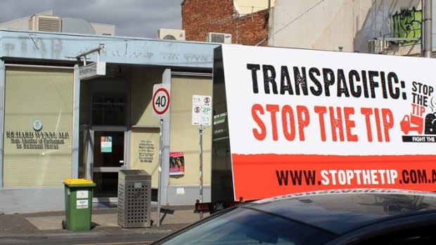 A Stop the Tip billboard parked outside Planning Minister Richard Wynne's electorate office last year. 