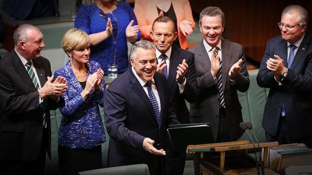 Treasurer Joe Hockey and Prime Minister Tony Abbott arrive to hand down the Budget in the House of Representatives at Parliament House on Tuesday 12 May 2015. 