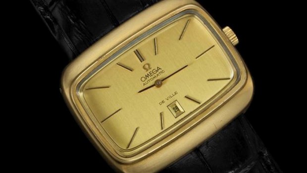 An Omega TV-shaped De Ville mens retro dress gold plated and stainless steel watch from the early 1970s.