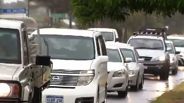 The heavy rainfall caused a commuter nightmare with sections of Perth's freeways flooding.