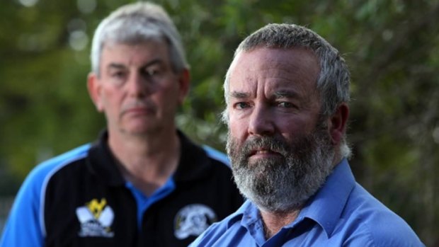 CFMEU members Lee Webb (left) and Dave McLachlan on April 19 - the day Mr McLachlan was sacked after an earlier protest at the Appin Colliery. The dismissal has sparked a national campaign. 