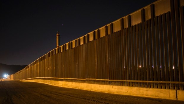 A portion of a new steel border fence stretches along the US-Mexico border in Sunland Park, New Mexico. 