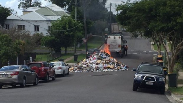 A rubbish truck driver dumped his load on Avondale Avenue, Annerley after it caught fire.