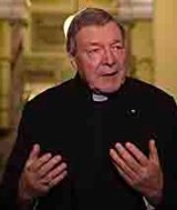 Cardinal George Pell talks to the press at the end of the Royal Commission's public hearing.