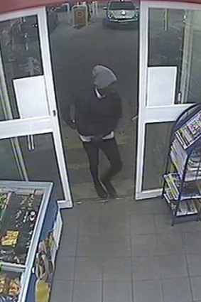 CCTV shows a man entering the Taylors Lakes service station early on Thursday morning.  