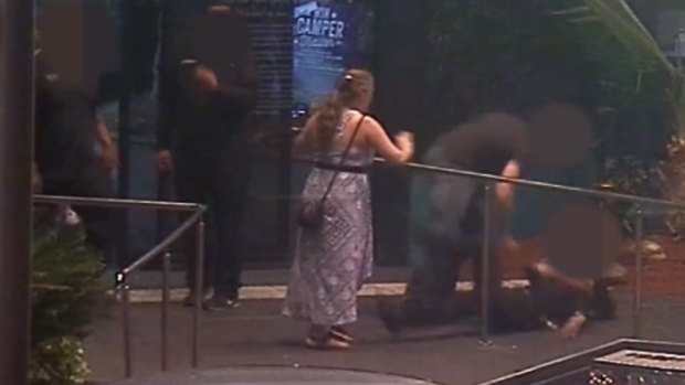 CCTV footage has captured an alleged one-punch attack on a Mount Isa mother outside a pub.