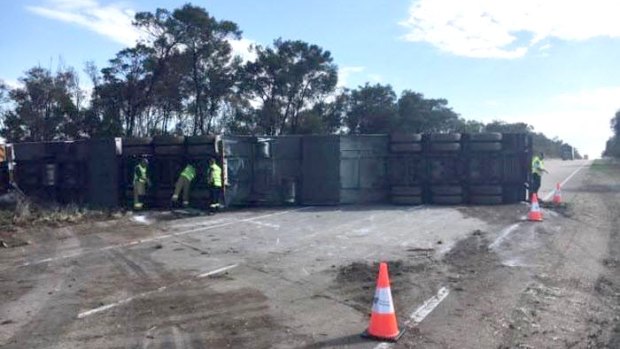 A truck carrying cheese has overturned on the Hume Motorway near Goulburn.