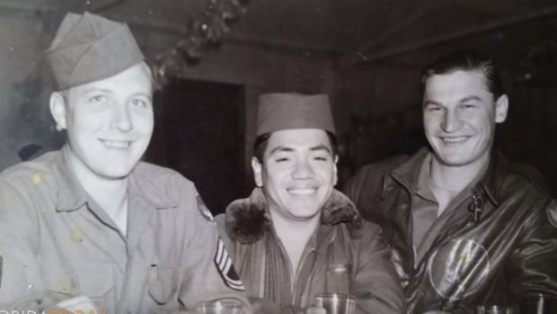Melvin Rector, left, with fellow soldiers during the war.
