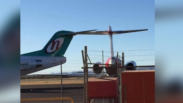 Two planes have clipped their tails together at Paraburdoo Airport.