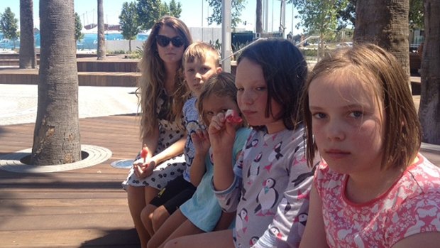 This Cottesloe family was unimpressed to find a bone-dry Elizabeth Quay water park earlier in the year.