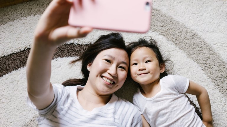 A plea for fathers to take more photos of the mother of their children