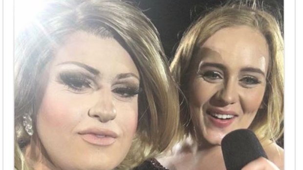 Adele impersonator feminem on stage with the real Adele at Domain Stadium.