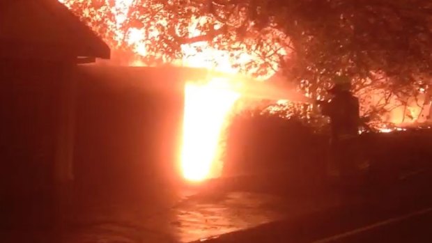 A fire destroyed a waterfront house at Palm Beach.